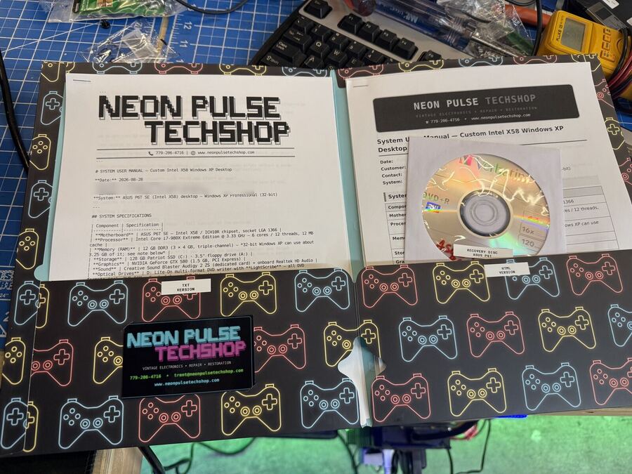 The NEON PULSE system kit: printed system manual, labelled restore disc and folder