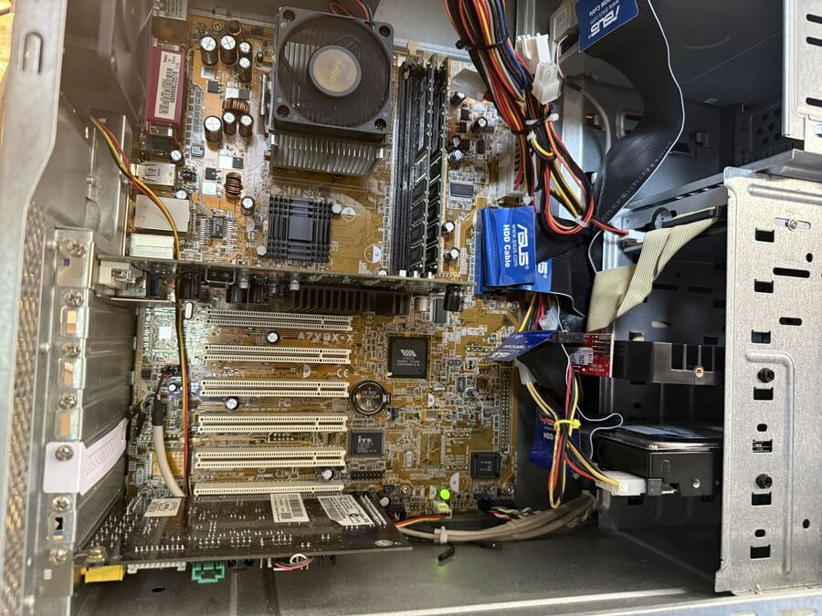 Open vintage case with expansion cards installed