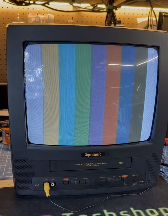 Symphonic TV and VCR combo showing color bars after repair